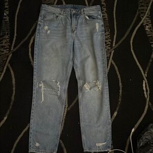 Woman's Distressed Blue Jeans